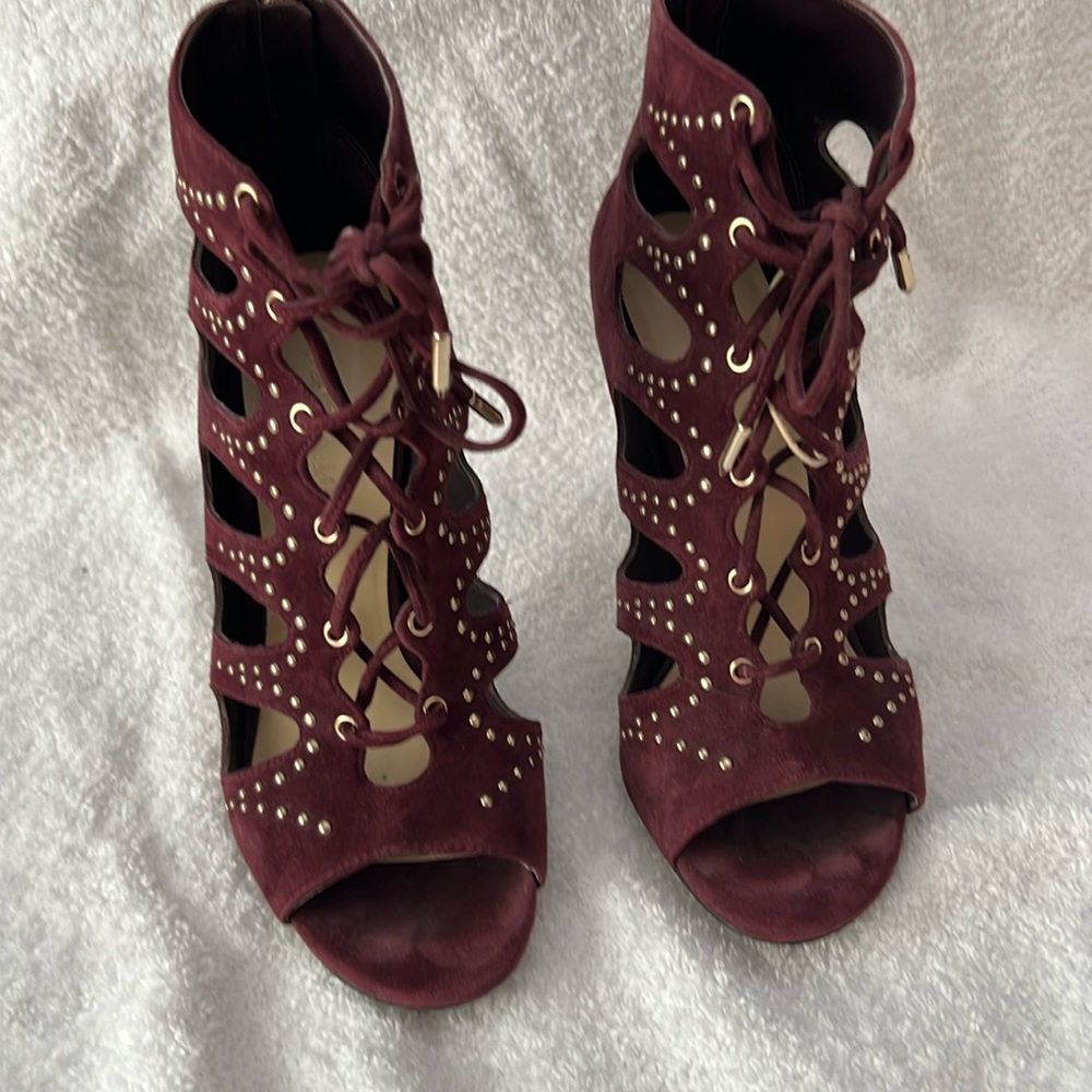 O
Worn once burgundy Sandal’s